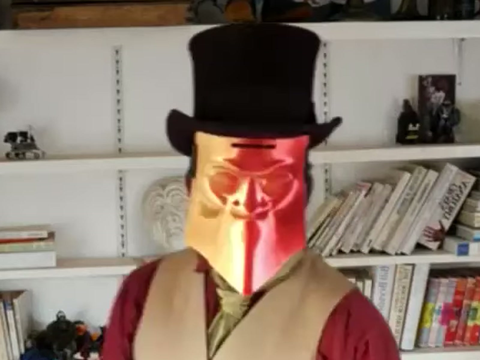 One of the PoliePals, masked, a frame from their own film